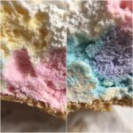 Close-up of the inside of two Lofthouse Cookies Soft Cookies, showing the colorful, soft texture.